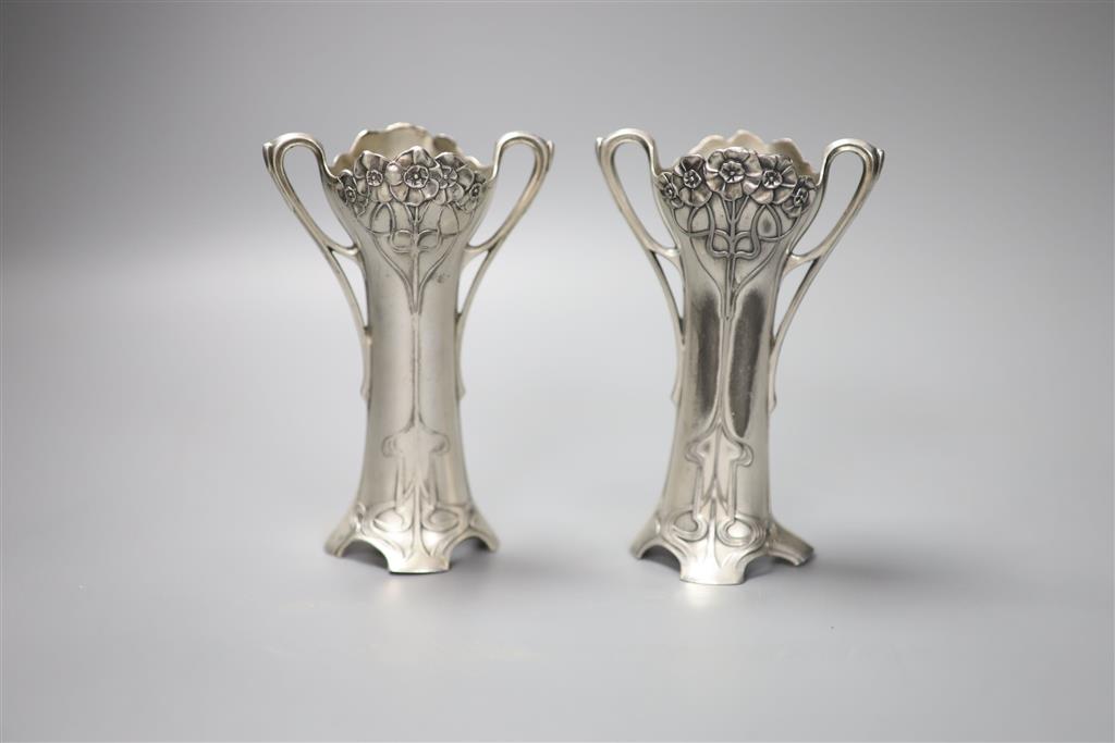 A pair of WMF two handled vases, both missing glass liners, height 13.5cm
